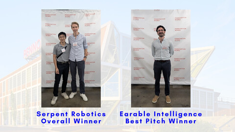 Overall and Best Pitch Winners standing in front of Pennovation step and repeat