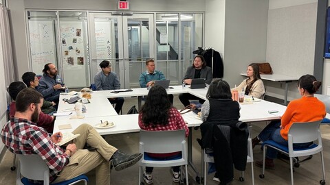 Attendees of lunch and learn participating in round table discussion