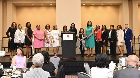 All Honorees stand onstage at the Philadelphia Tribune's 2024 Women of Achievement luncheon