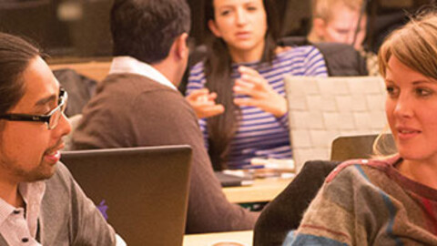 Students chatting at a table