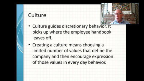 a photo of Michael in the corner, with a screenshot of a slide on "Culture"