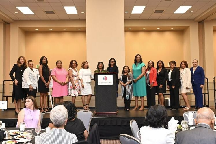 All Honorees stand onstage at the Philadelphia Tribune's 2024 Women of Achievement luncheon