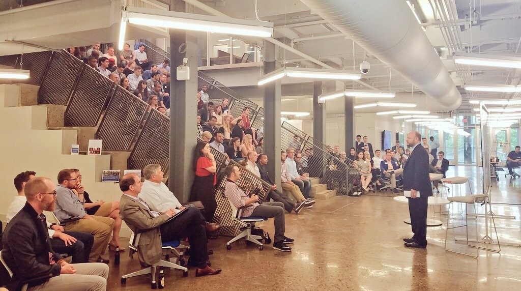 Group gathered on the stairs for Franklin Park LLC Investment Roundtable
