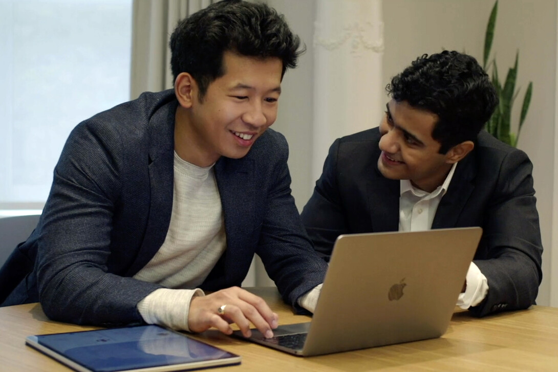 The two founders of Mobility Health working at a desk at the Pennovation Center