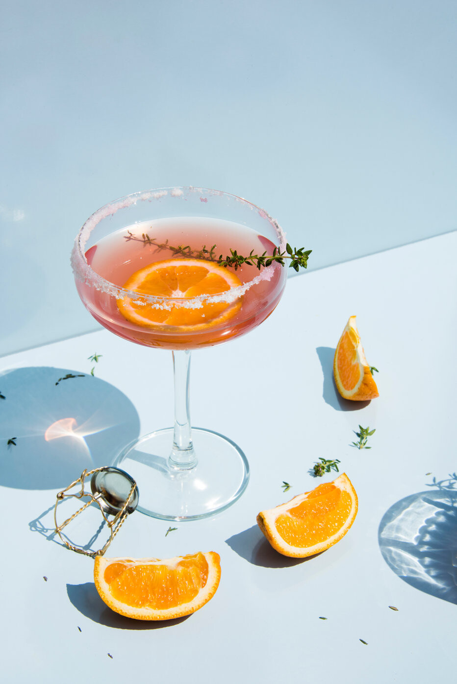 Cocktail with orange slices below